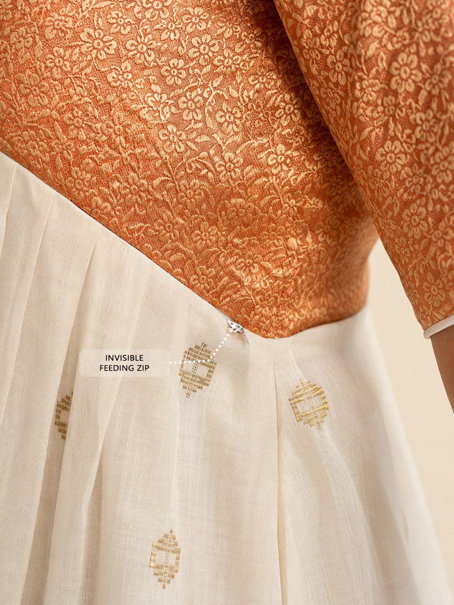 Ziva Onam Maternity & Feeding Dress | Onakodi | Off White Handloom Cotton with Orange-Gold Brocade Yoke | Gold Zari Motifs