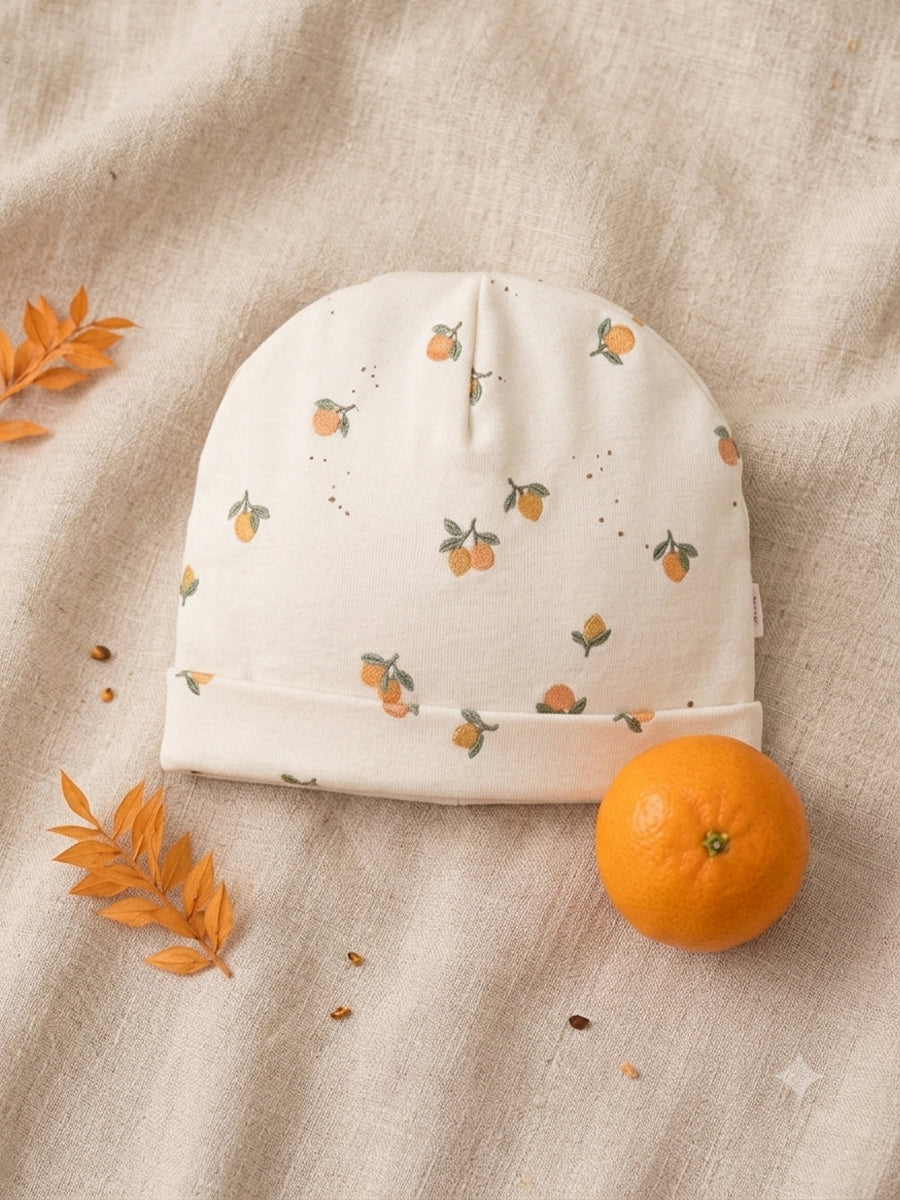 Ziva Baby Sleepsuit with Cap – Off White Tiny Orange Fruit Print | Premium Knitted Cotton | Front Zip | Fold-Over Mittens & Integrated Booties