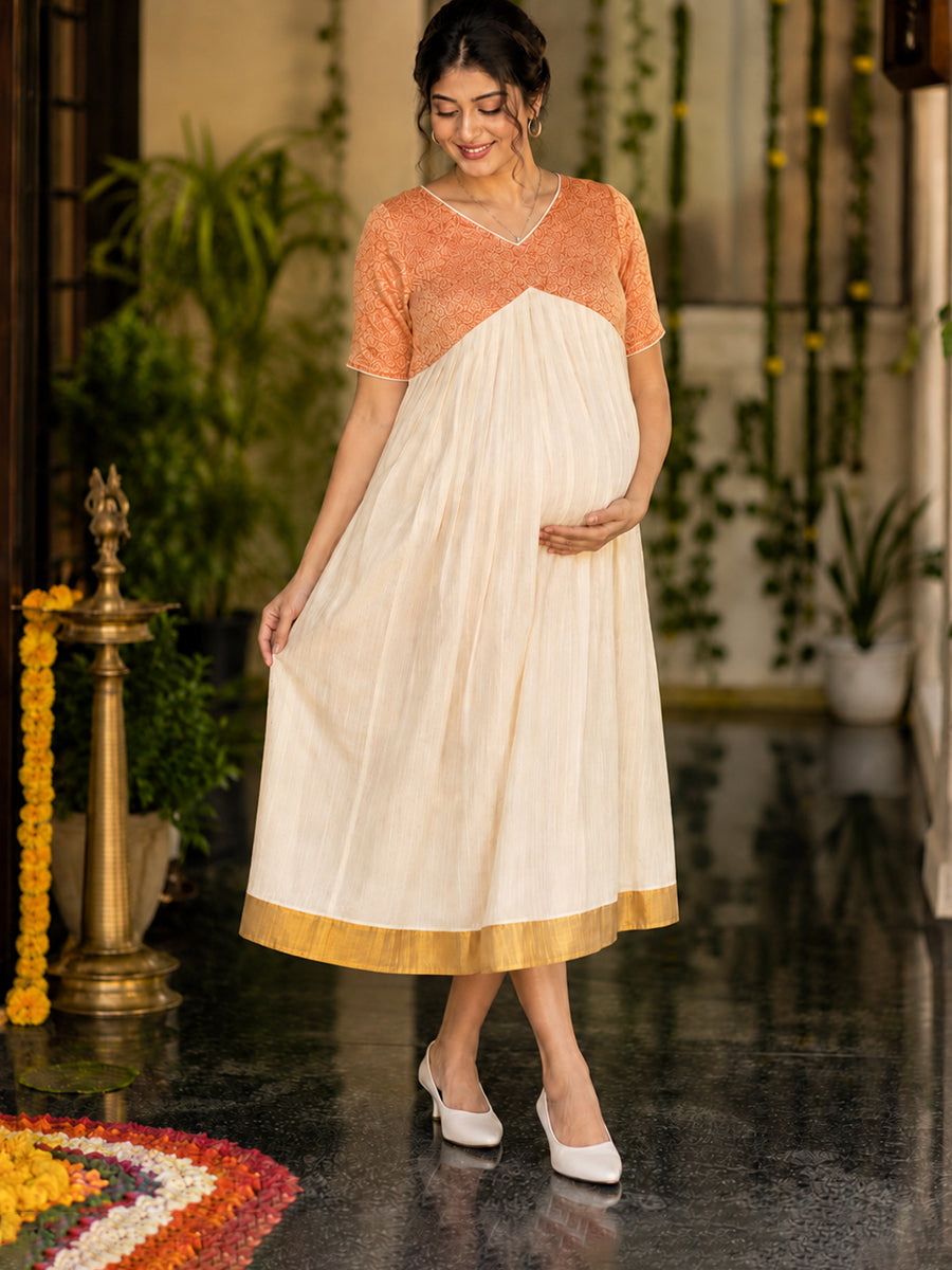 Ziva Onam Maternity & Feeding Dress | Onakodi | Off White Handloom Cotton with Orange-Gold Brocade Yoke | Golden Kasavu Border