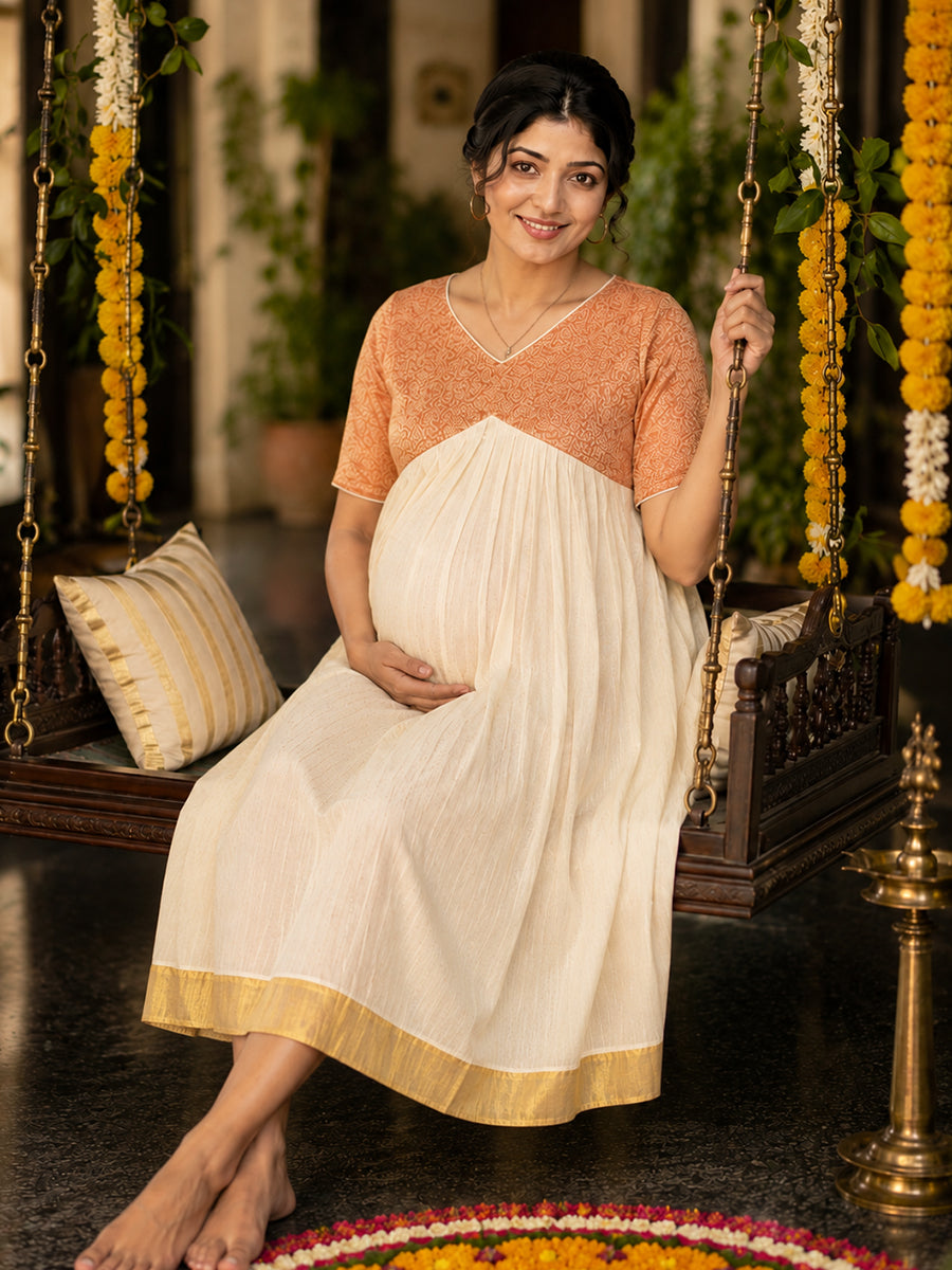 Ziva Onam Maternity & Feeding Dress | Onakodi | Off White Handloom Cotton with Orange-Gold Brocade Yoke | Golden Kasavu Border