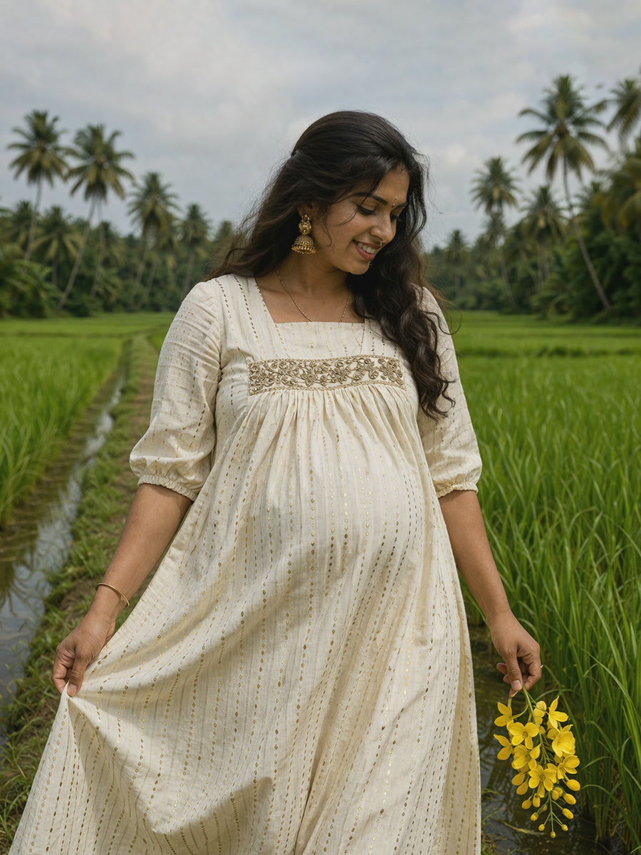 Ziva Maternity & Feeding Cotton Midi Dress with Embroidered Lace Yoke & Concealed Zip – Light Cream Gold Line Vishu & Festive Collection