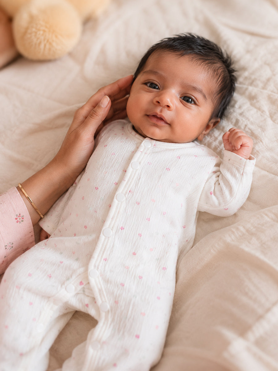 Ziva Baby Jumpsuit – Off White | Tiny Pastel Heart Sprinkle Print | Soft Waffle Knitted Cotton | Front Open Snap Button