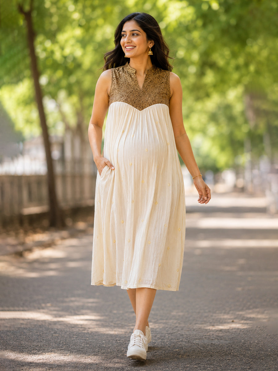Ziva Onam Maternity & Feeding Sleeveless Dress | Onakodi | Light Cream Handloom Cotton with Caramel Brown Banarasi Yoke | Hidden Feeding Zips & Side Pocket