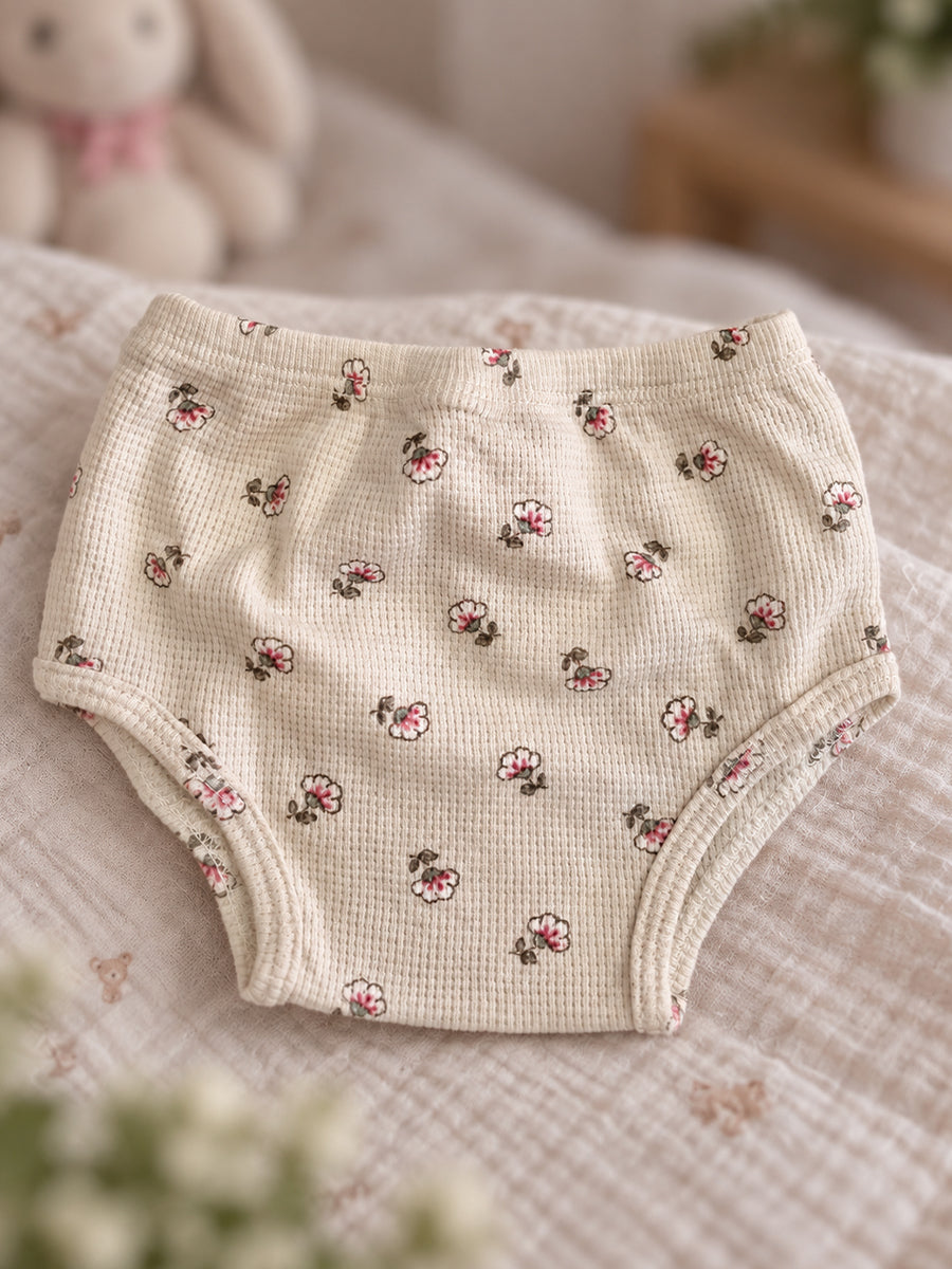 Ziva Baby Girl Frock with Pantie – Soft Cream Tiny Blossom Print | Premium Knitted Cotton | Shoulder Buttons & Front Pockets | 2-Piece Set