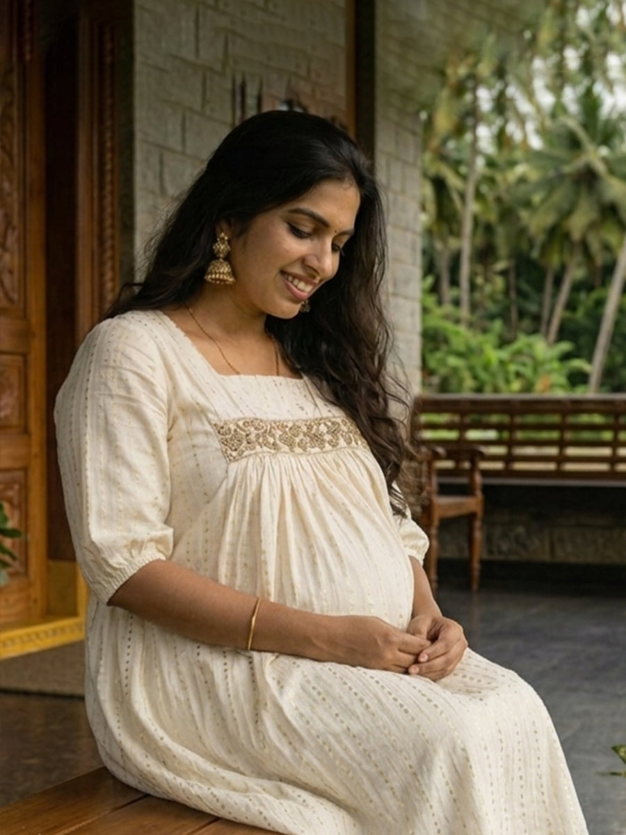 Ziva Maternity & Feeding Cotton Midi Dress with Embroidered Lace Yoke & Concealed Zip – Light Cream Gold Line Vishu & Festive Collection