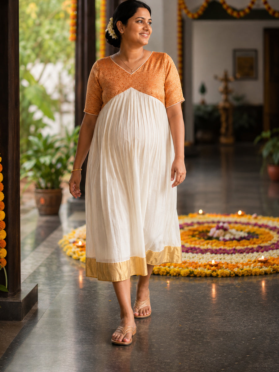Ziva Onam Maternity & Feeding Dress | Onakodi | Off White Handloom Cotton with Orange-Gold Brocade Yoke | Golden Kasavu Border