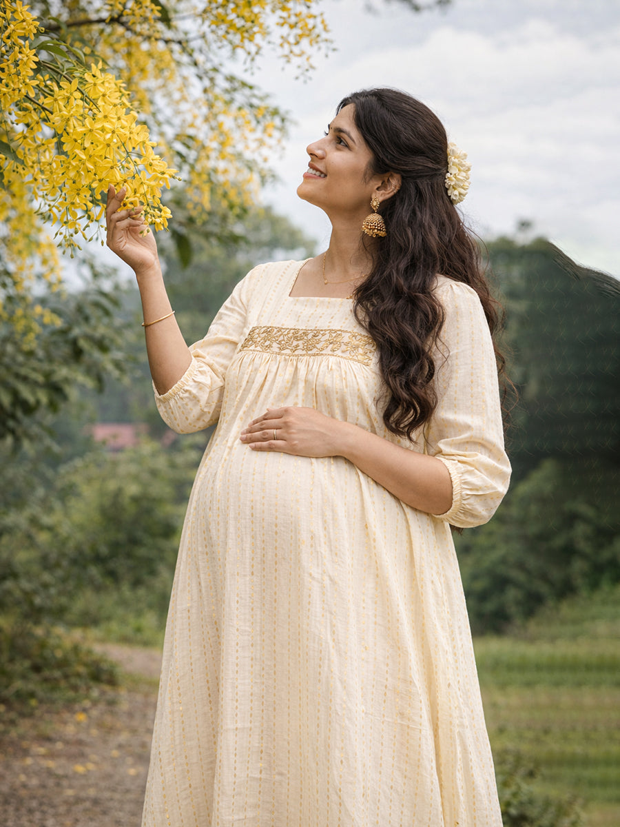 Ziva Maternity & Feeding Cotton Midi Dress with Embroidered Lace Yoke & Concealed Zip – Light Cream Gold Line Vishu & Festive Collection