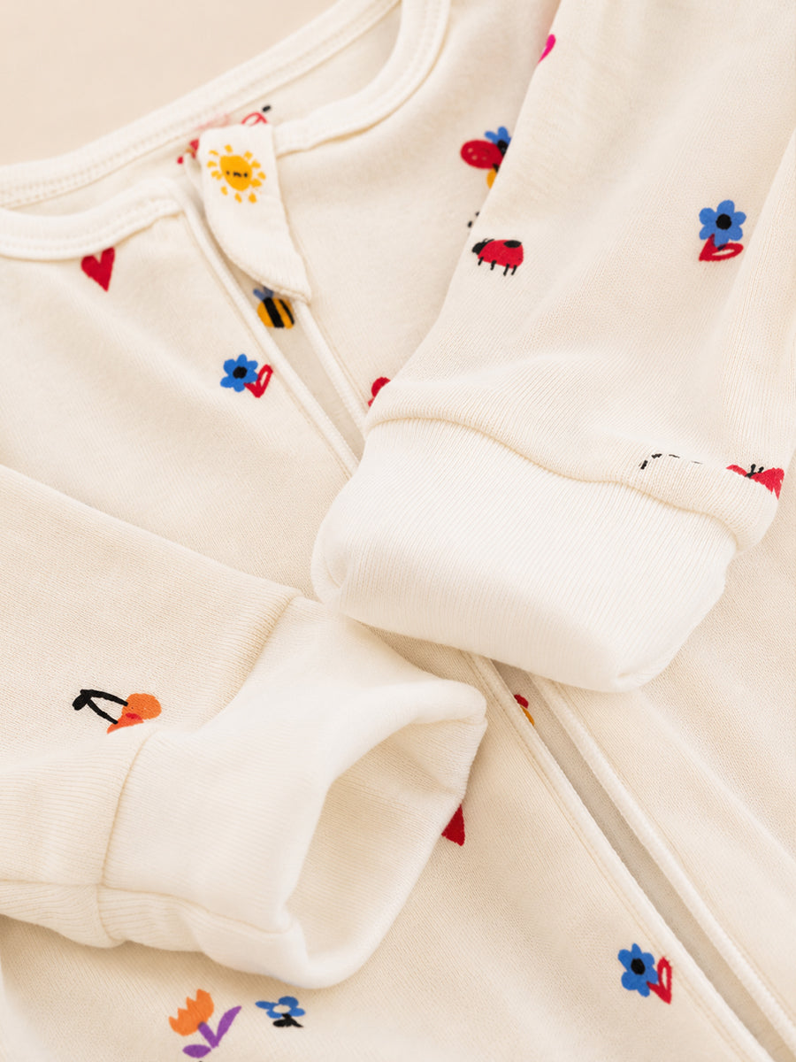 Ziva Knitted Cotton Baby Sleepsuit with Cap – Garden Bugs & Nature Print | Cream