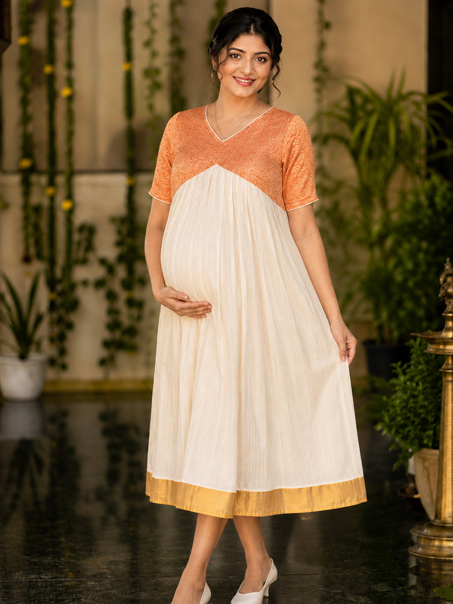 Ziva Onam Maternity & Feeding Dress | Onakodi | Off White Handloom Cotton with Orange-Gold Brocade Yoke | Golden Kasavu Border