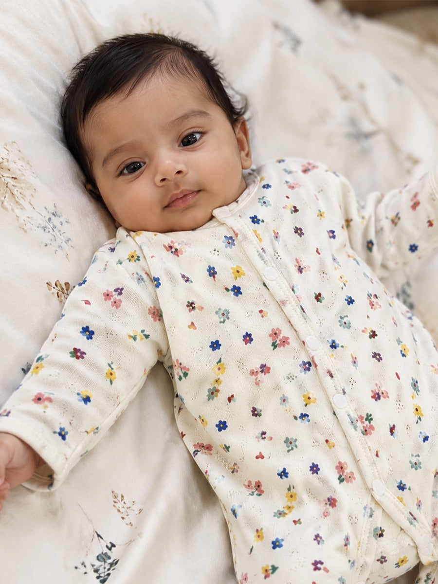Ziva Baby Jumpsuit – Off White | Tiny Garden Hearts & Flowers Print | Premium Needle-Hole Knitted Cotton | Front Open Snap Button
