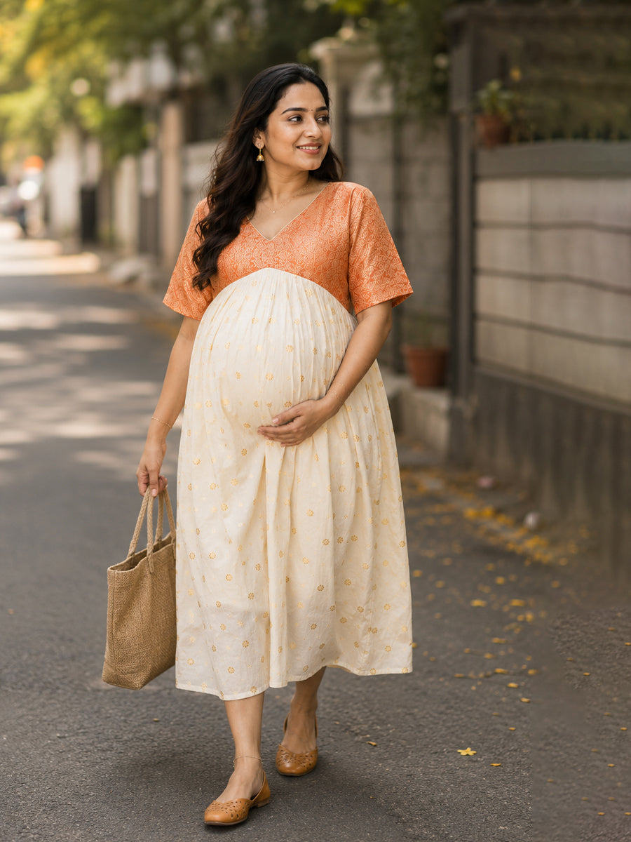 Ziva Onam Maternity & Feeding Dress | Onakodi | Off White Handloom Cotton with Orange-Gold Brocade Yoke | Gold Zari Motifs