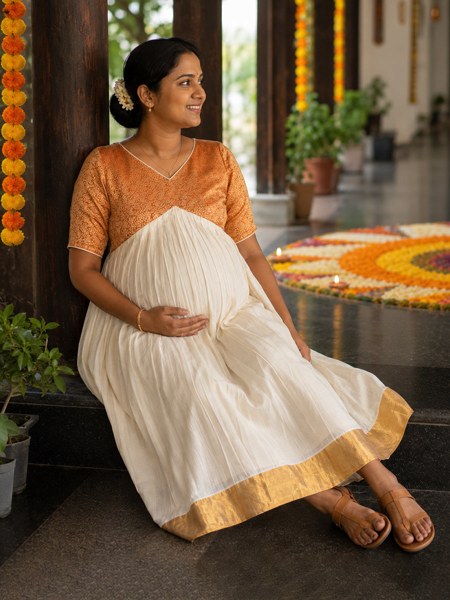 Ziva Onam Maternity & Feeding Dress | Onakodi | Off White Handloom Cotton with Orange-Gold Brocade Yoke | Golden Kasavu Border