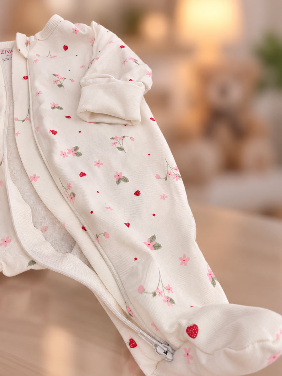Ziva Baby Sleepsuit with Cap – Off White Tiny Strawberry Blossom Print | Premium Knitted Cotton | Front Zip | Fold-Over Mittens & Integrated Booties
