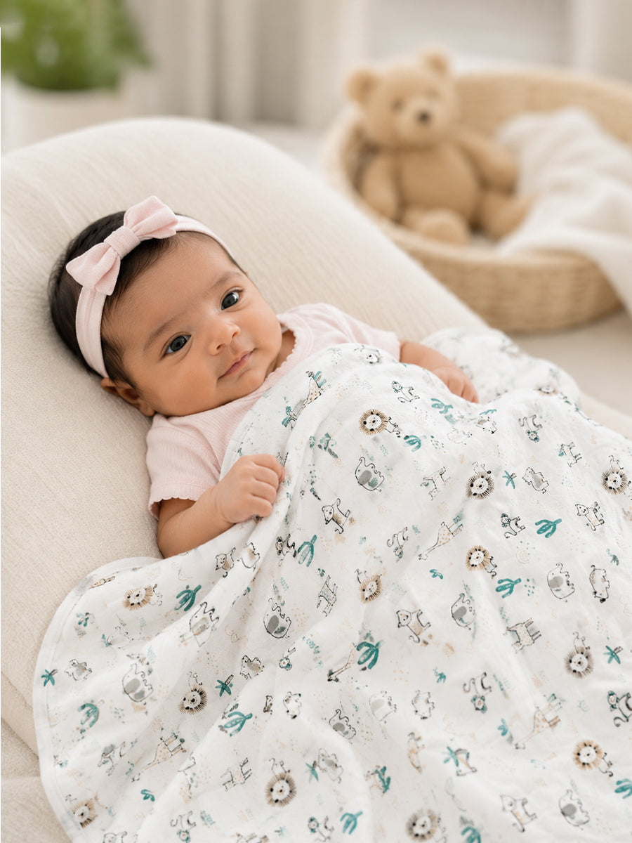 Ziva Baby Blanket – White | Tiny Safari Parade Print | Knitted Cotton