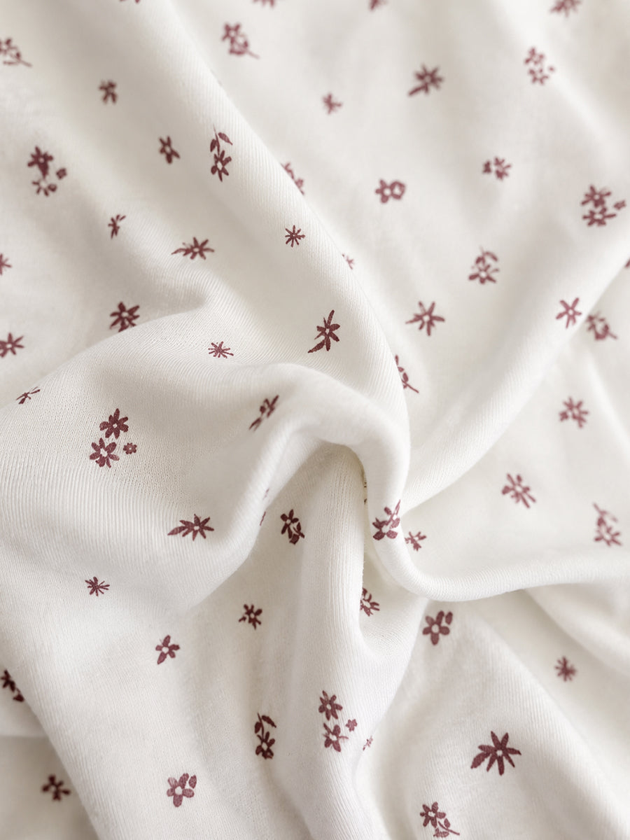 Ziva Baby Sleepsuit with Cap – Knitted Cotton Front Zip, Fold-Over Mittens & Integrated Booties | Sweet Meadow Floral Print