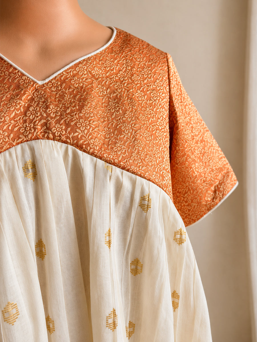 Ziva Onam Maternity & Feeding Dress | Onakodi | Off White Handloom Cotton with Orange-Gold Brocade Yoke | Gold Zari Motifs