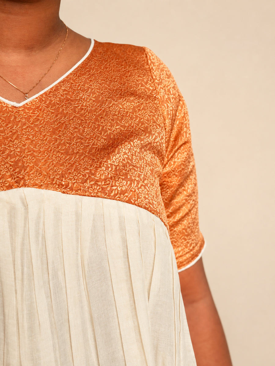 Ziva Onam Maternity & Feeding Dress | Onakodi | Off White Handloom Cotton with Orange-Gold Brocade Yoke | Golden Kasavu Border