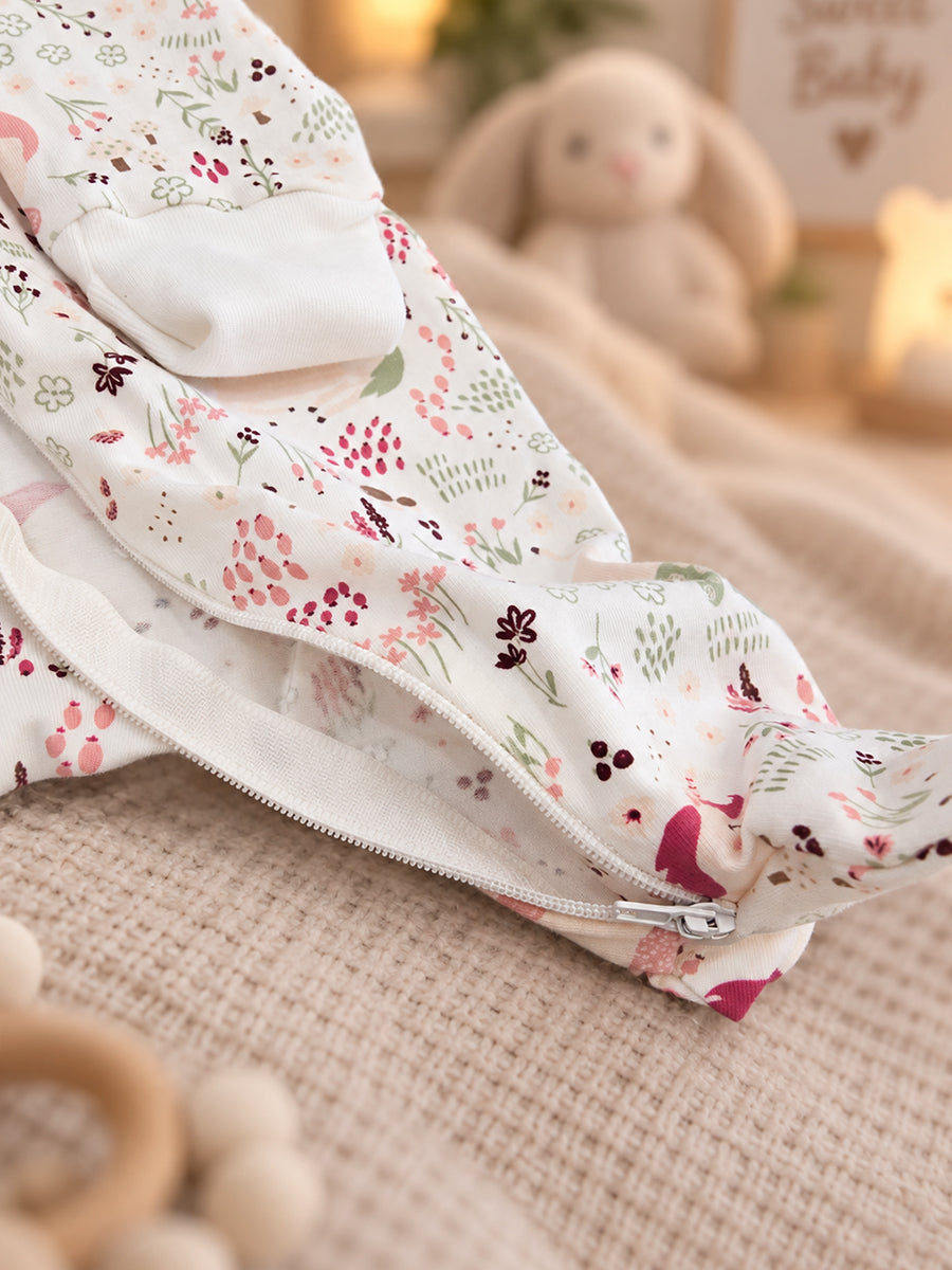 Ziva Baby Sleepsuit with Cap – Off White Unicorn Garden Print | Premium Knitted Cotton | Front Zip | Fold-Over Mittens & Integrated Booties