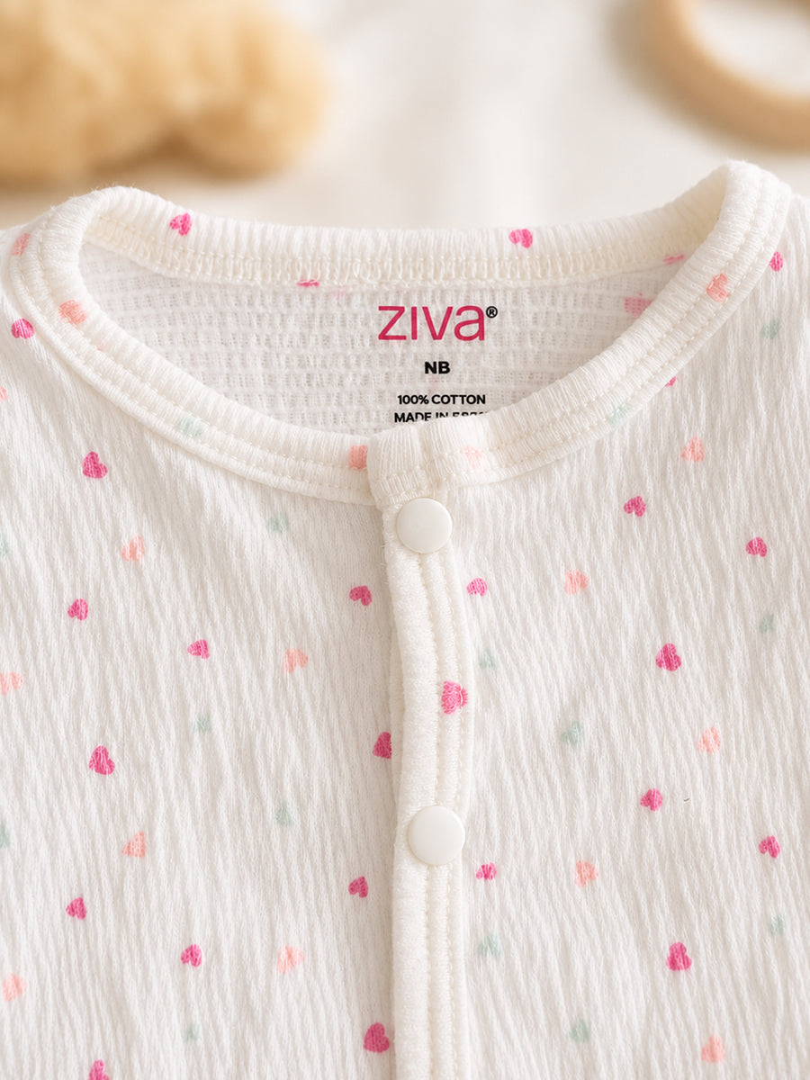 Ziva Baby Jumpsuit – Off White | Tiny Pastel Heart Sprinkle Print | Soft Waffle Knitted Cotton | Front Open Snap Button