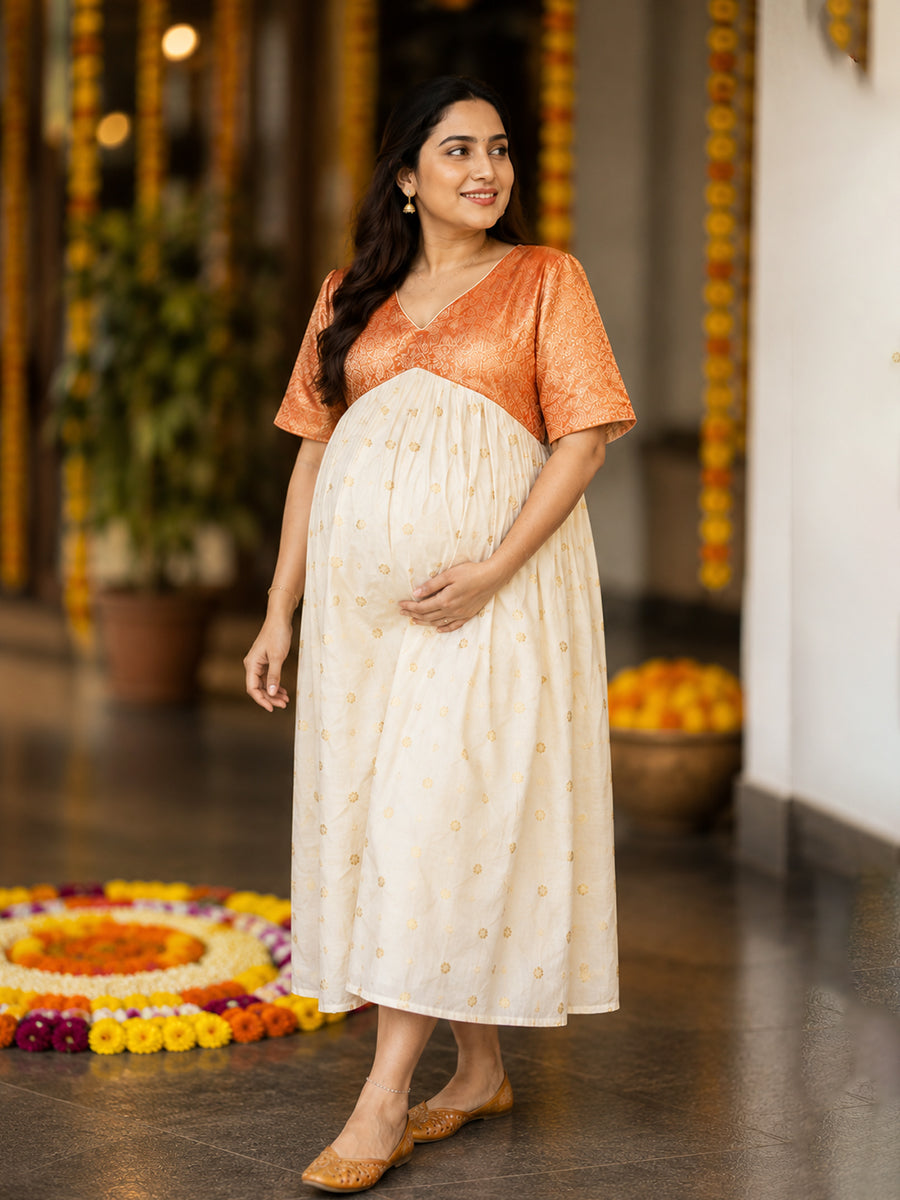 Ziva Onam Maternity & Feeding Dress | Onakodi | Off White Handloom Cotton with Orange-Gold Brocade Yoke | Gold Zari Motifs