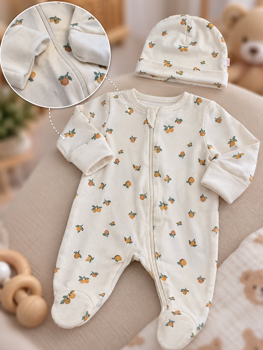 Ziva Baby Sleepsuit with Cap – Off White Tiny Orange Fruit Print | Premium Knitted Cotton | Front Zip | Fold-Over Mittens & Integrated Booties