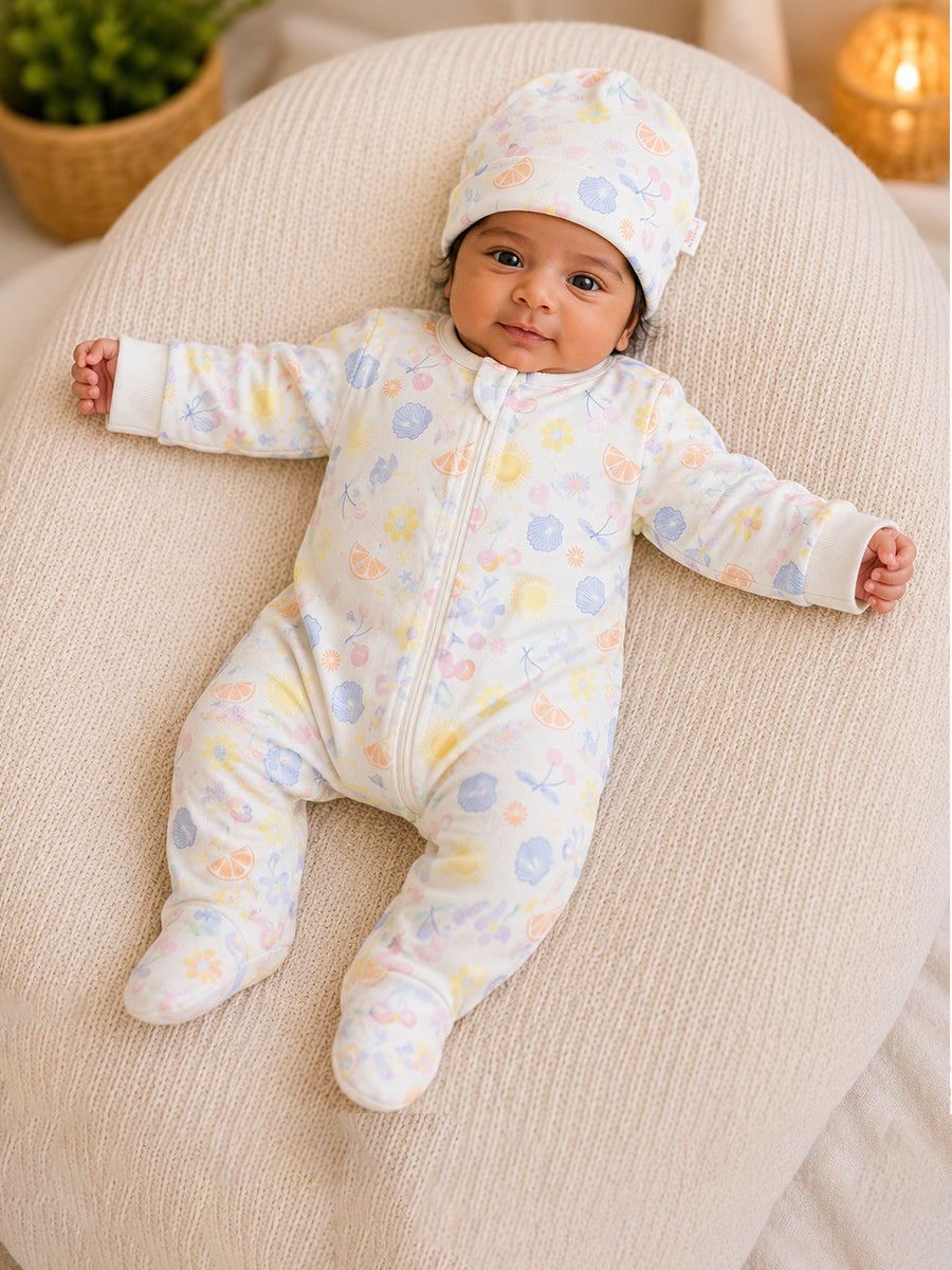 Ziva Baby Sleepsuit with Cap – Knitted Cotton Front Zip, Fold-Over Mittens & Integrated Booties | Pastel Coastal Bloom Print