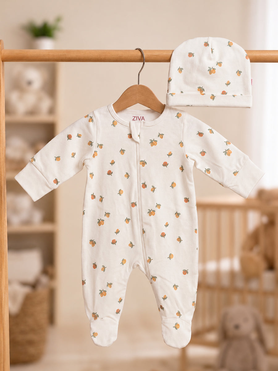Ziva Baby Sleepsuit with Cap – Off White Tiny Orange Fruit Print | Premium Knitted Cotton | Front Zip | Fold-Over Mittens & Integrated Booties