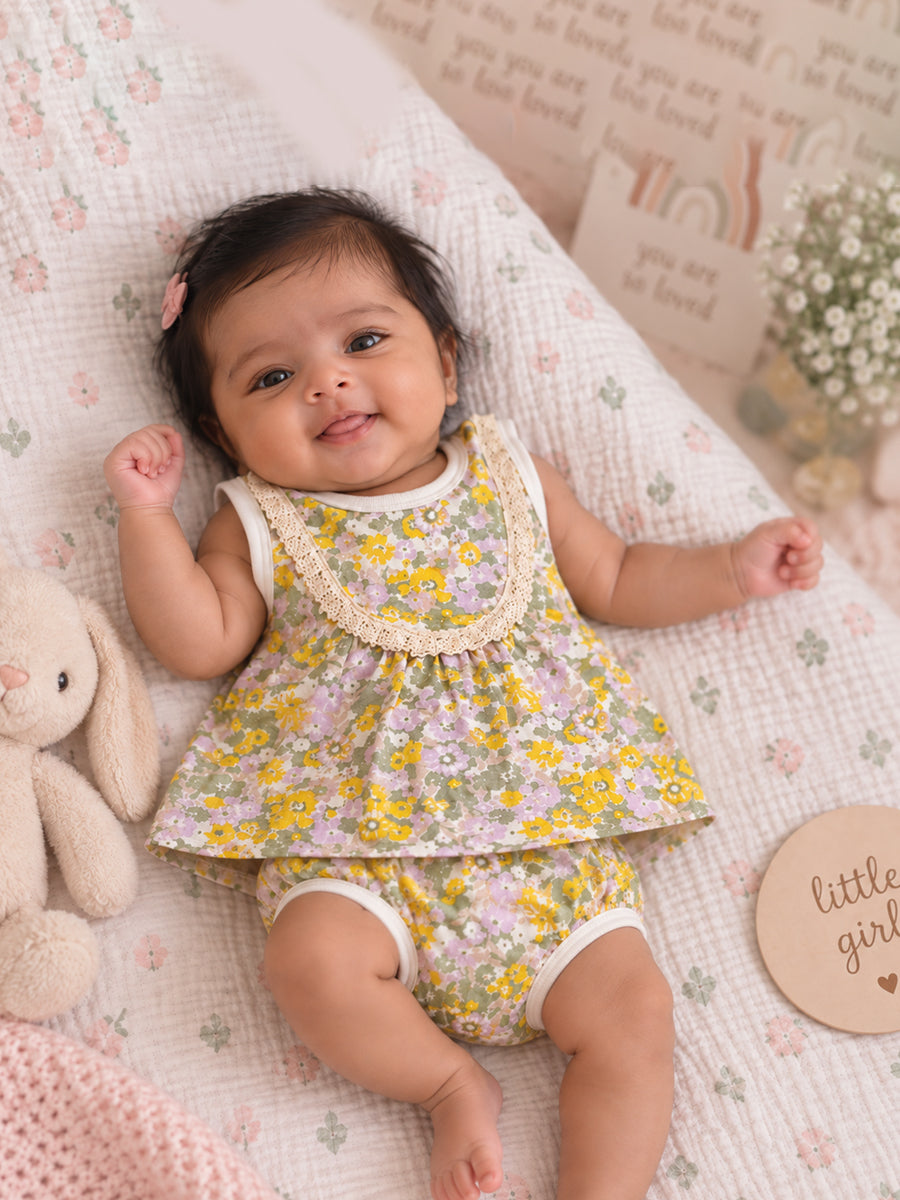 Ziva Baby Girl Frock with Pantie – Pastel Yellow & Lilac Floral Print | Premium Knitted Cotton | Cream Lace Yoke | 2-Piece Set