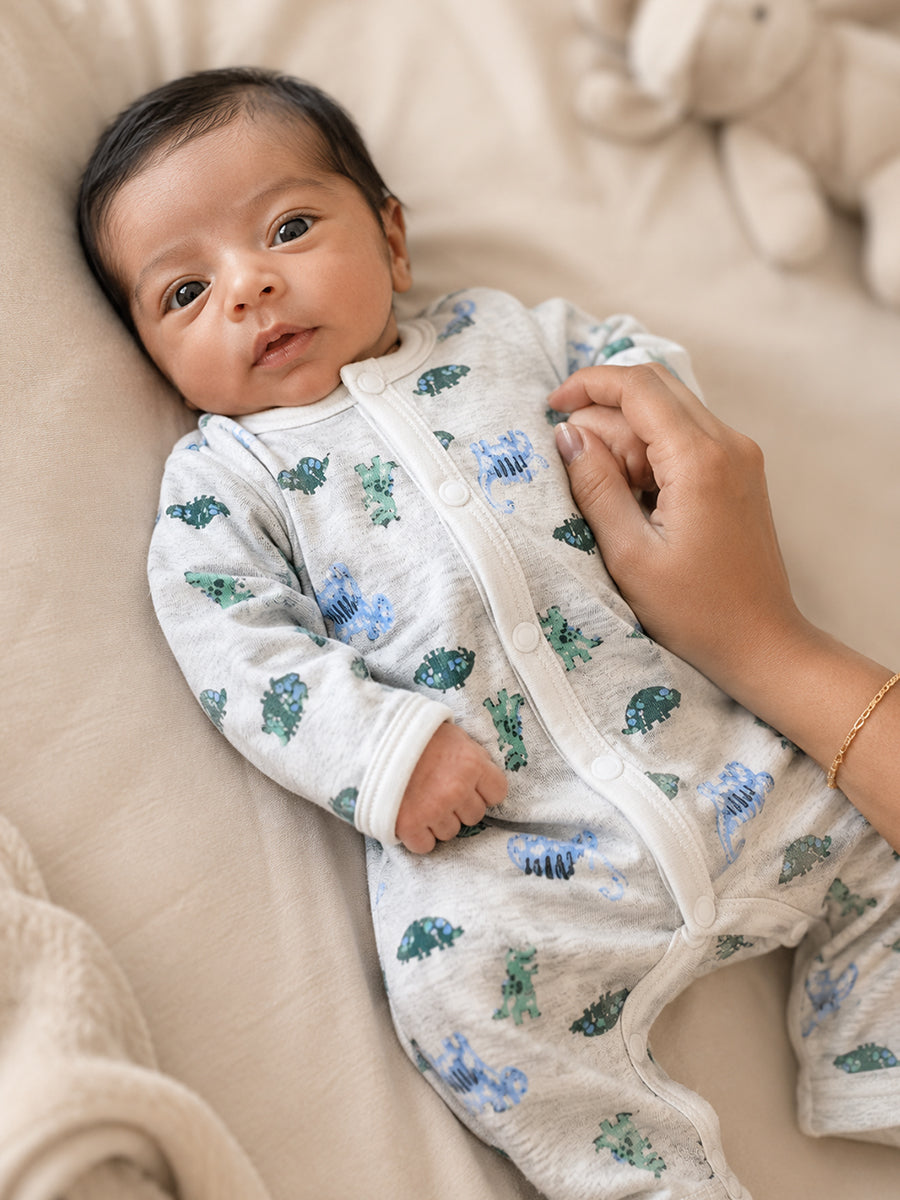Ziva Baby Jumpsuit – Light Ash | Safari Dinosaur Print | Knitted Cotton | Front Open Snap Button