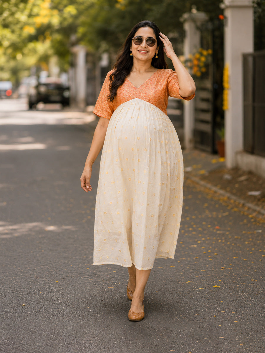 Ziva Onam Maternity & Feeding Dress | Onakodi | Off White Handloom Cotton with Orange-Gold Brocade Yoke | Gold Zari Motifs