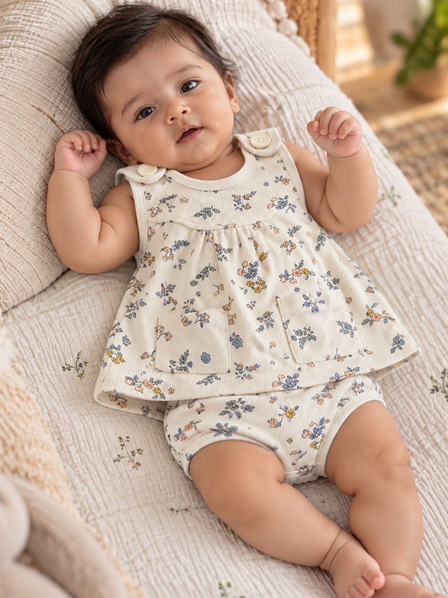 Ziva Baby Girl Frock with Pantie – Soft Cream Blue & Peach Floral Print | Premium Knitted Cotton | Shoulder Buttons & Front Pockets | 2-Piece Set