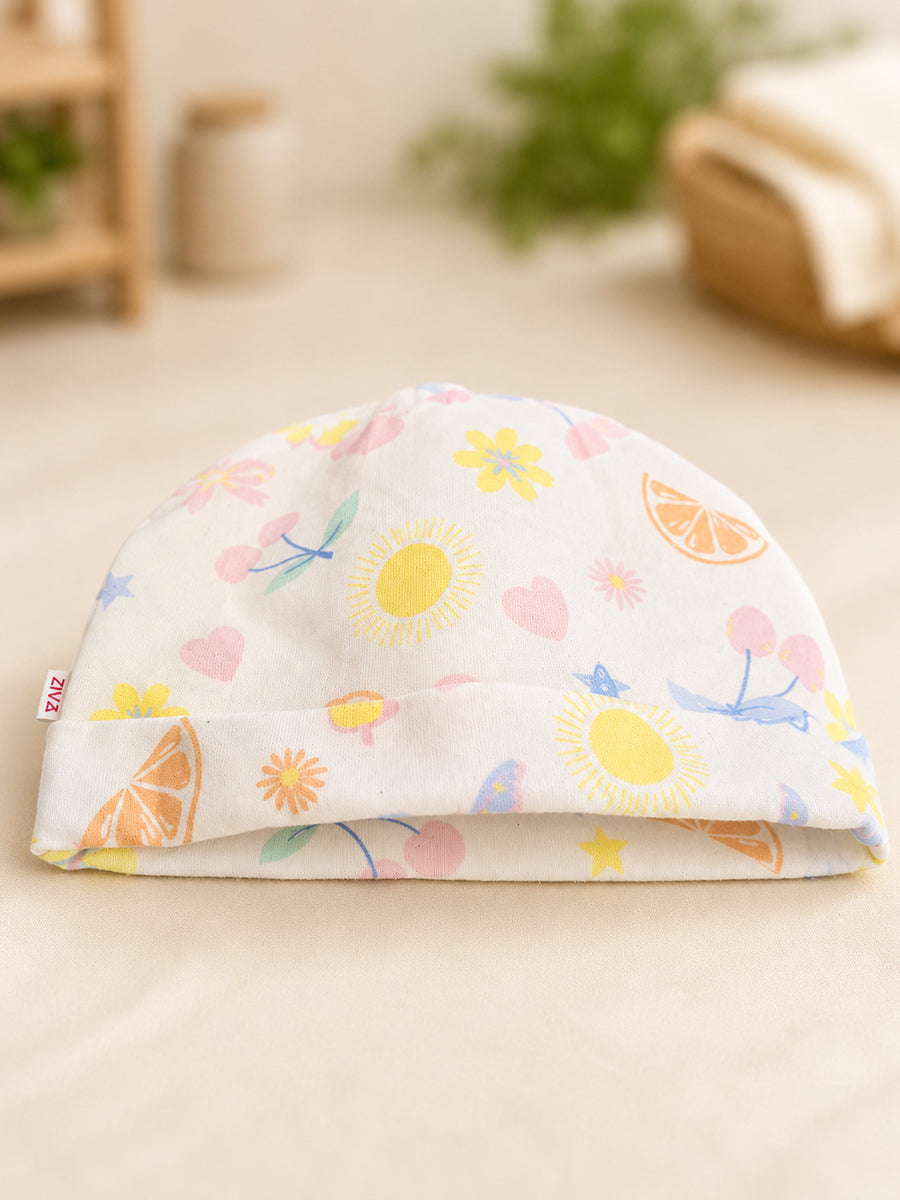 Ziva Baby Sleepsuit with Cap – Knitted Cotton Front Zip, Fold-Over Mittens & Integrated Booties | Pastel Coastal Bloom Print