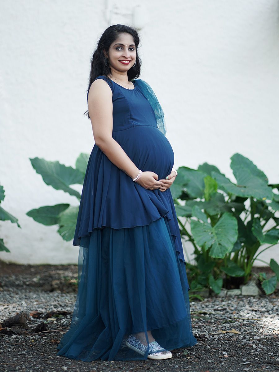 Maternity Photoshoot Shown Blue Gown