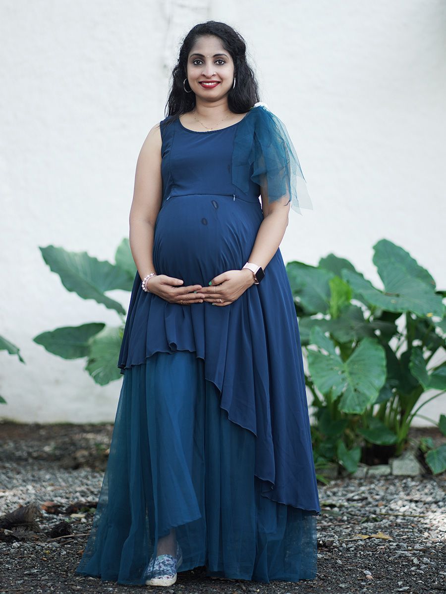 Maternity Photoshoot Shown Blue Gown