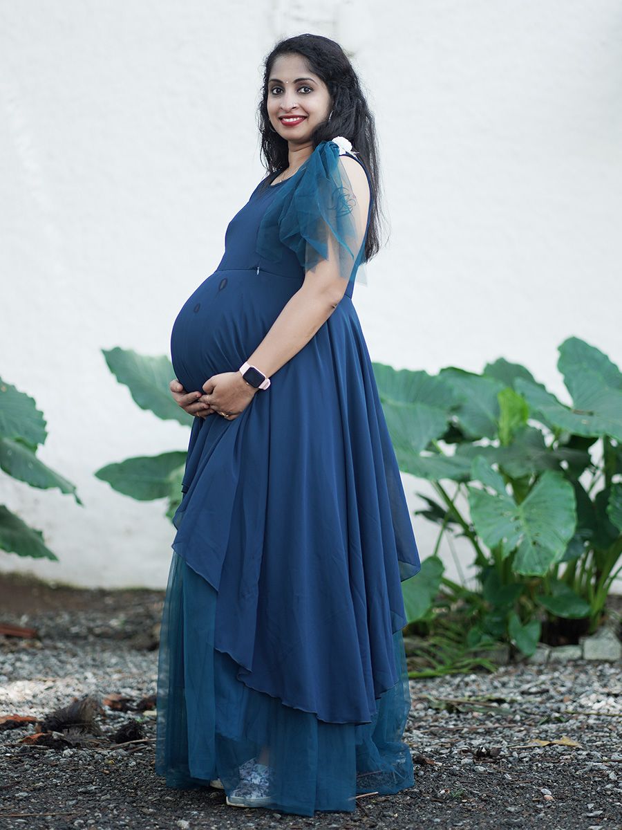 Maternity Photoshoot Shown Blue Gown