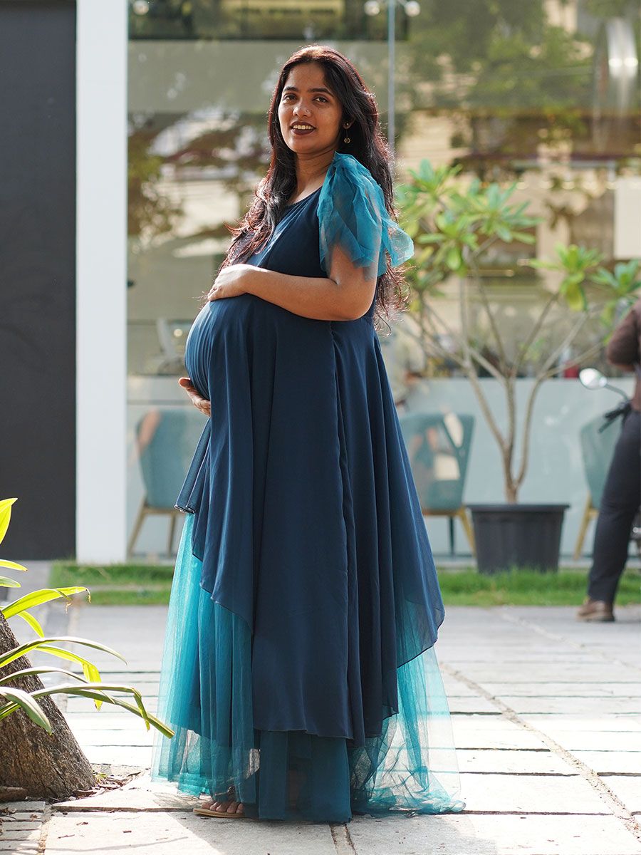 Maternity Photoshoot Shown Blue Gown