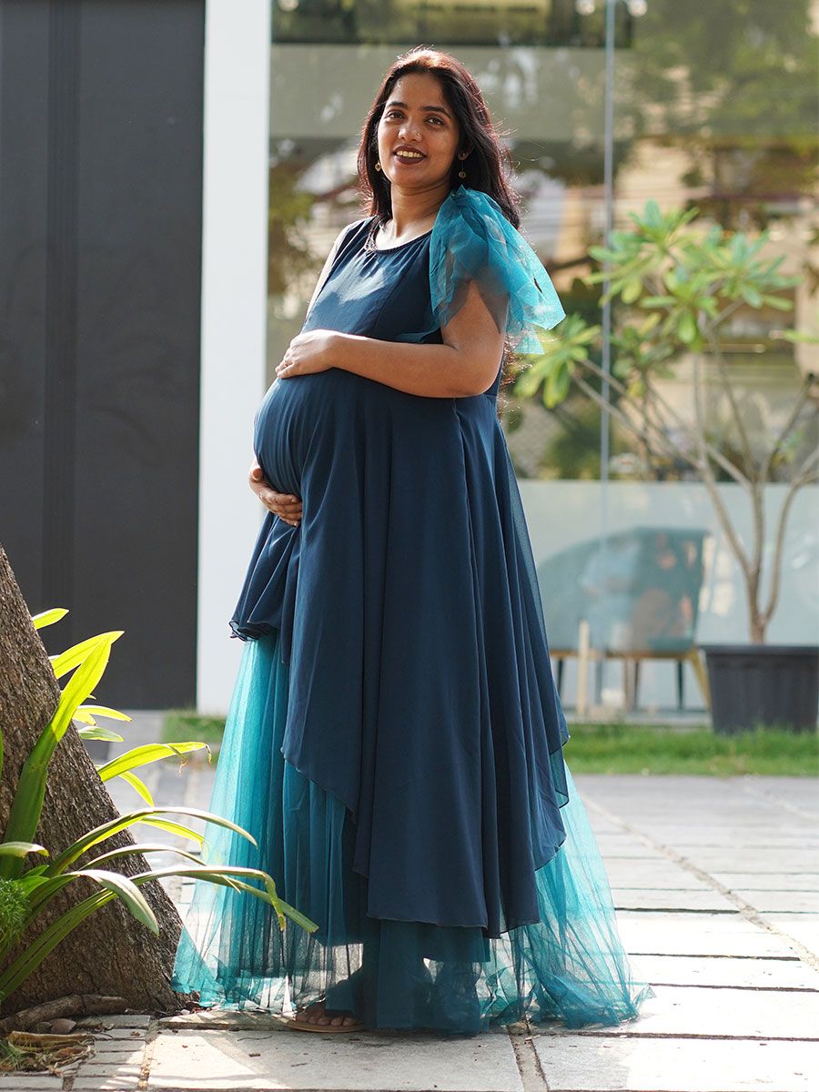Maternity Photoshoot Shown Blue Gown