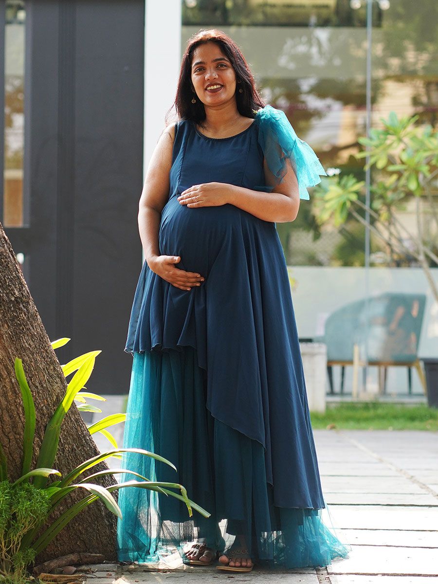 Maternity Photoshoot Shown Blue Gown