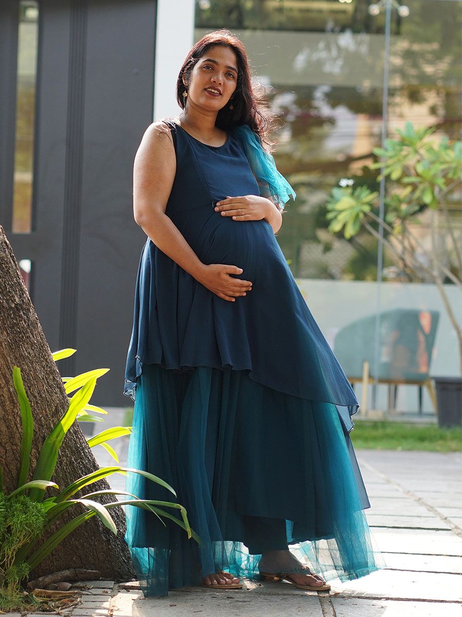 Maternity Photoshoot Shown Blue Gown