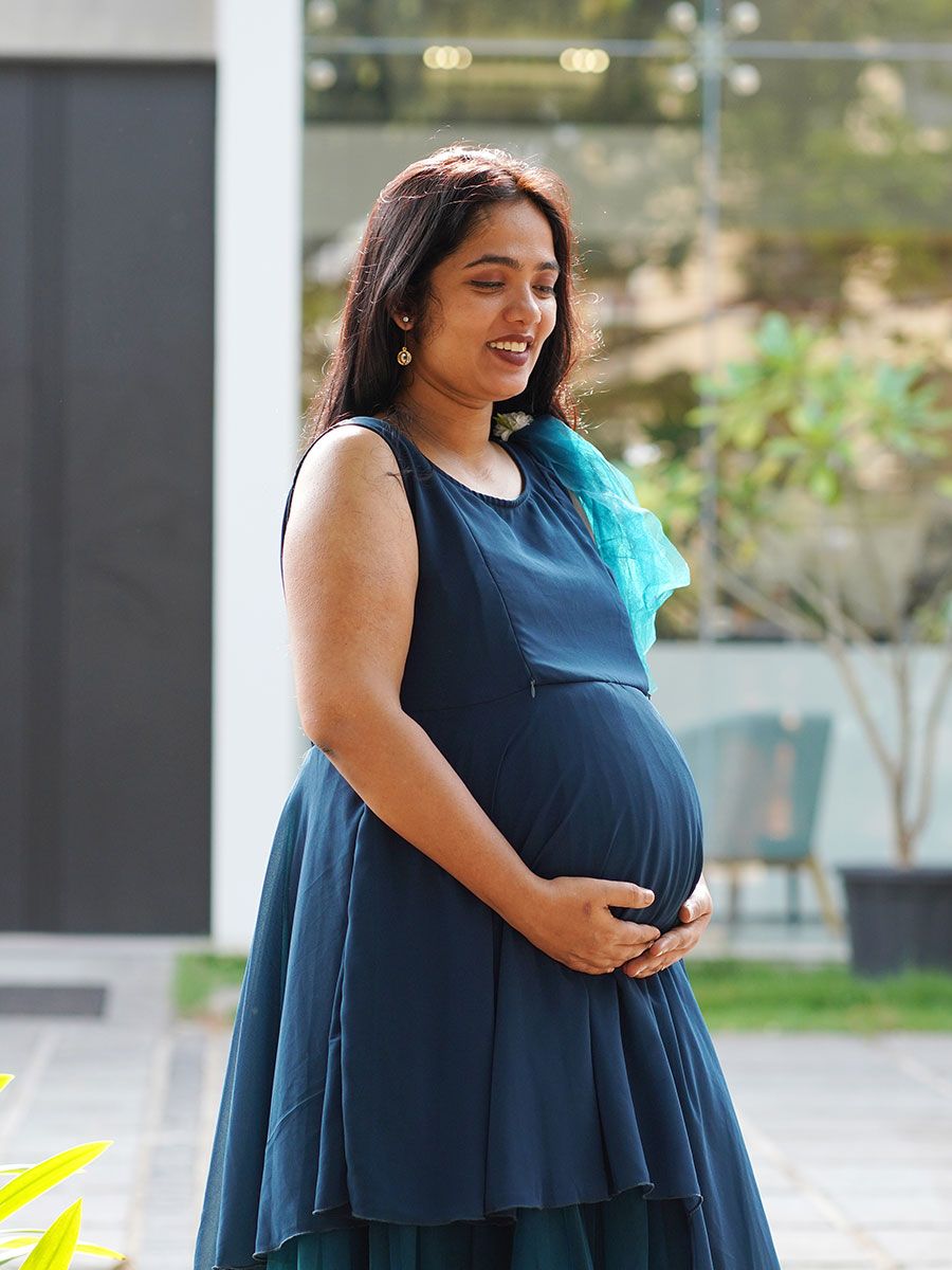 Maternity Photoshoot Shown Blue Gown