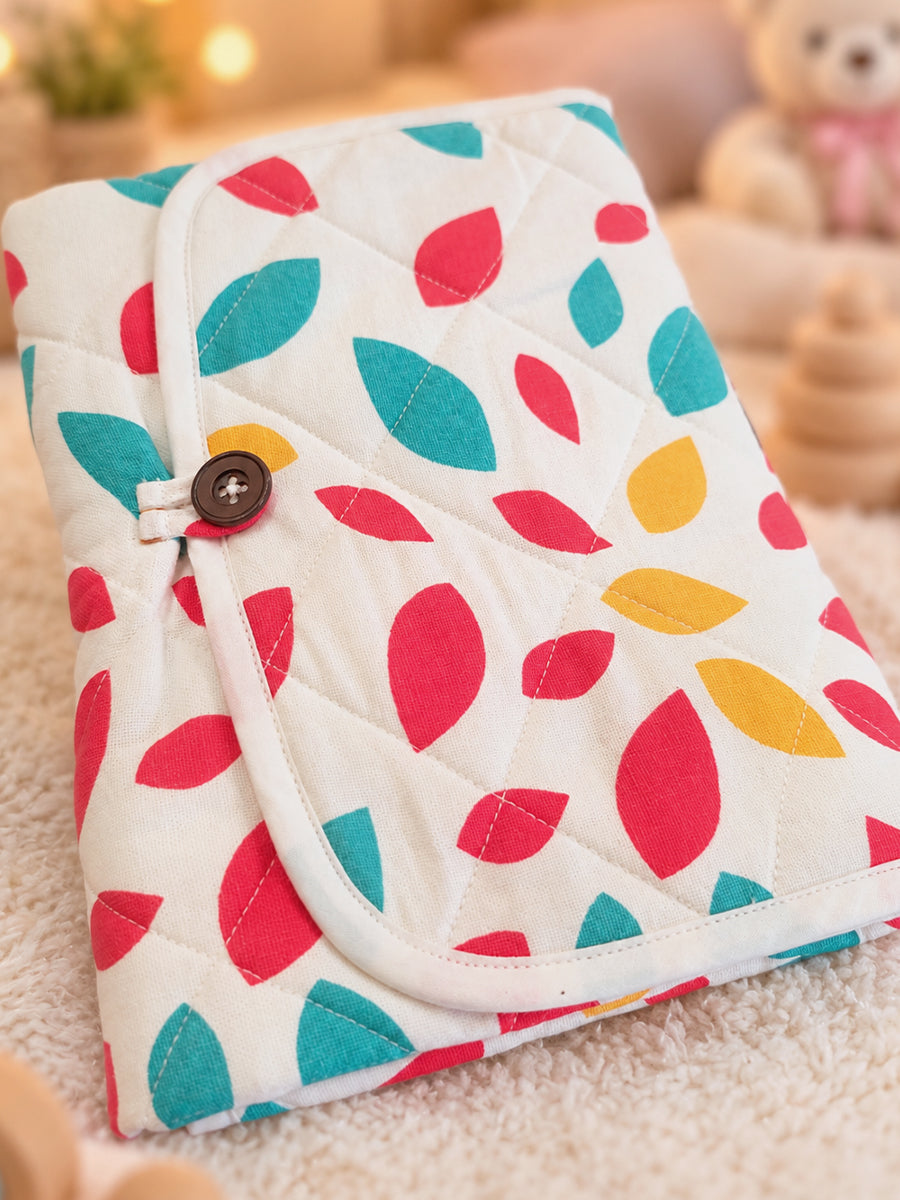 Ziva Baby Nappy & Diaper Changing Sheet – Foldable Travel Changing Mat with Storage Pocket | Off-White Multicolour Leaf Print
