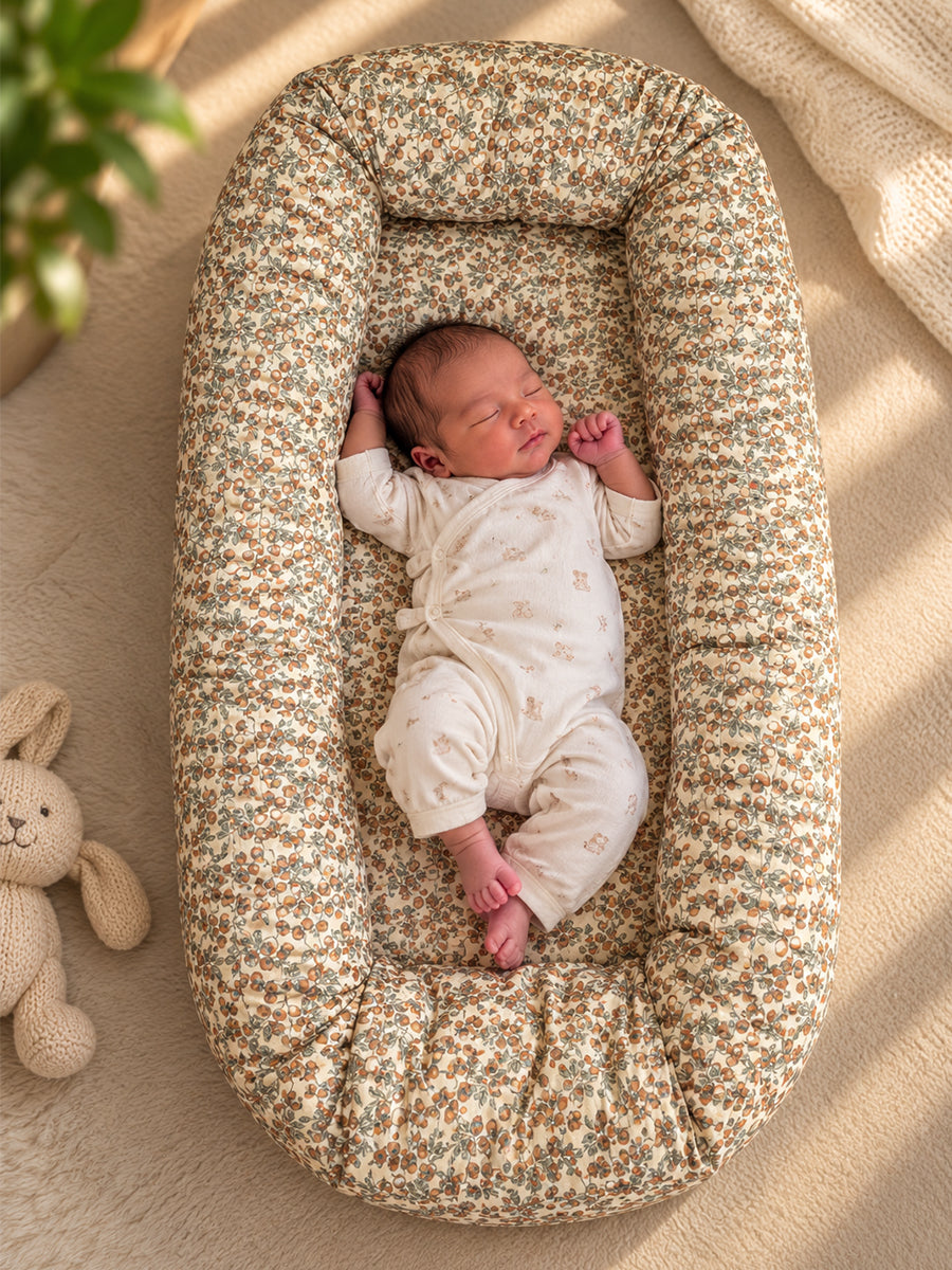 Premium Organic Cotton Multipurpose Baby Nest – Newborn Baby Lounger & Baby Bed | Rust Orange Botanical Fruit Print | Ziva Collected | Carefully Selected for Your Little One