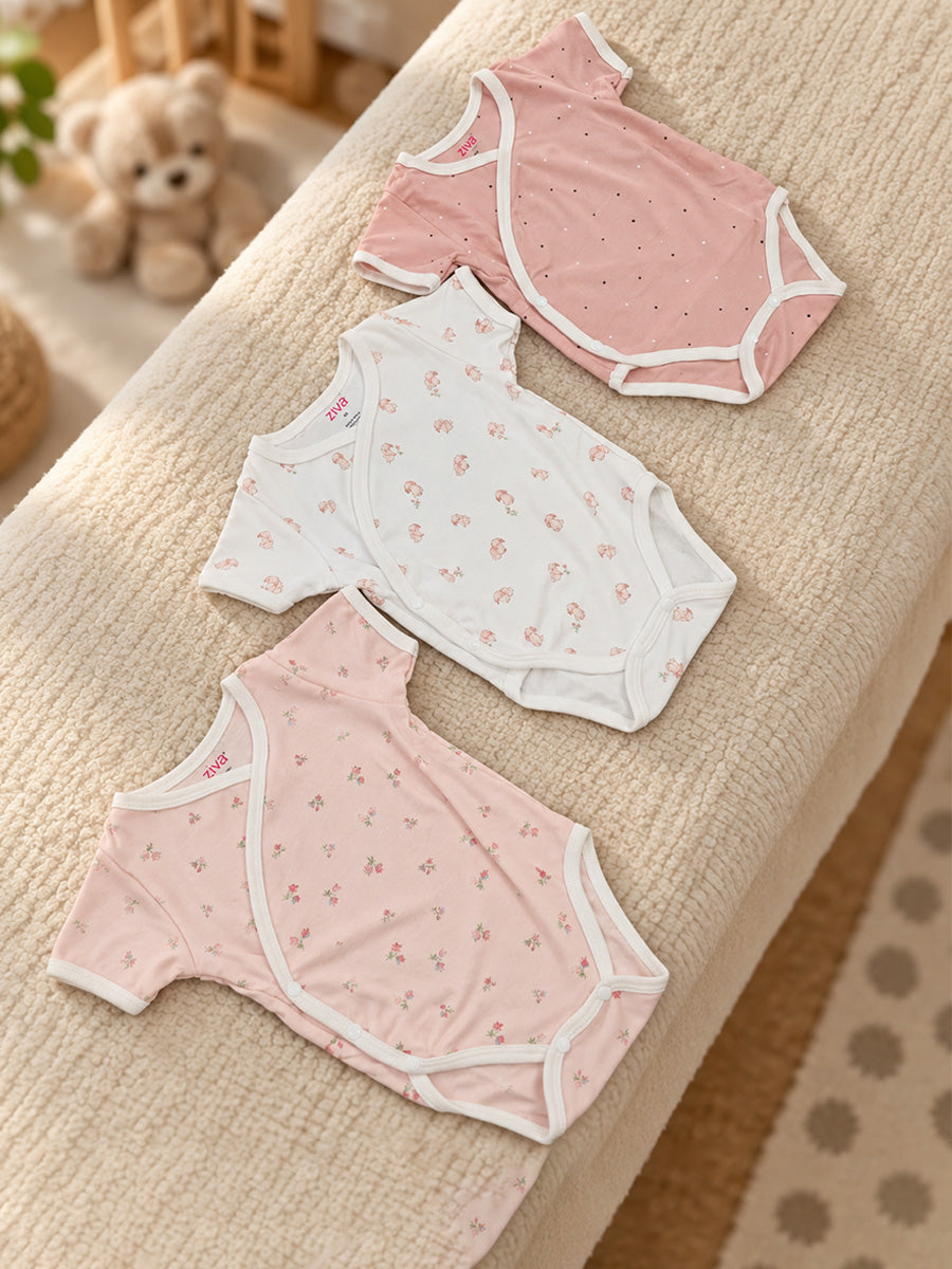 Ziva Baby Premium Knitted Cotton Overlap Romper – Pack of 3 | Blush Pink Tiny Floral, Dusty Rose Mini Dot & White Peach Bunny Assorted Prints.