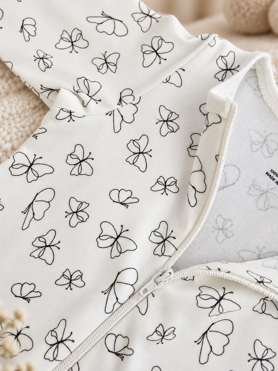 Ziva Baby Sleepsuit with Cap – Off-White Butterfly Print | Premium Knitted Cotton | Front Zip | Fold-Over Mittens & Integrated Booties