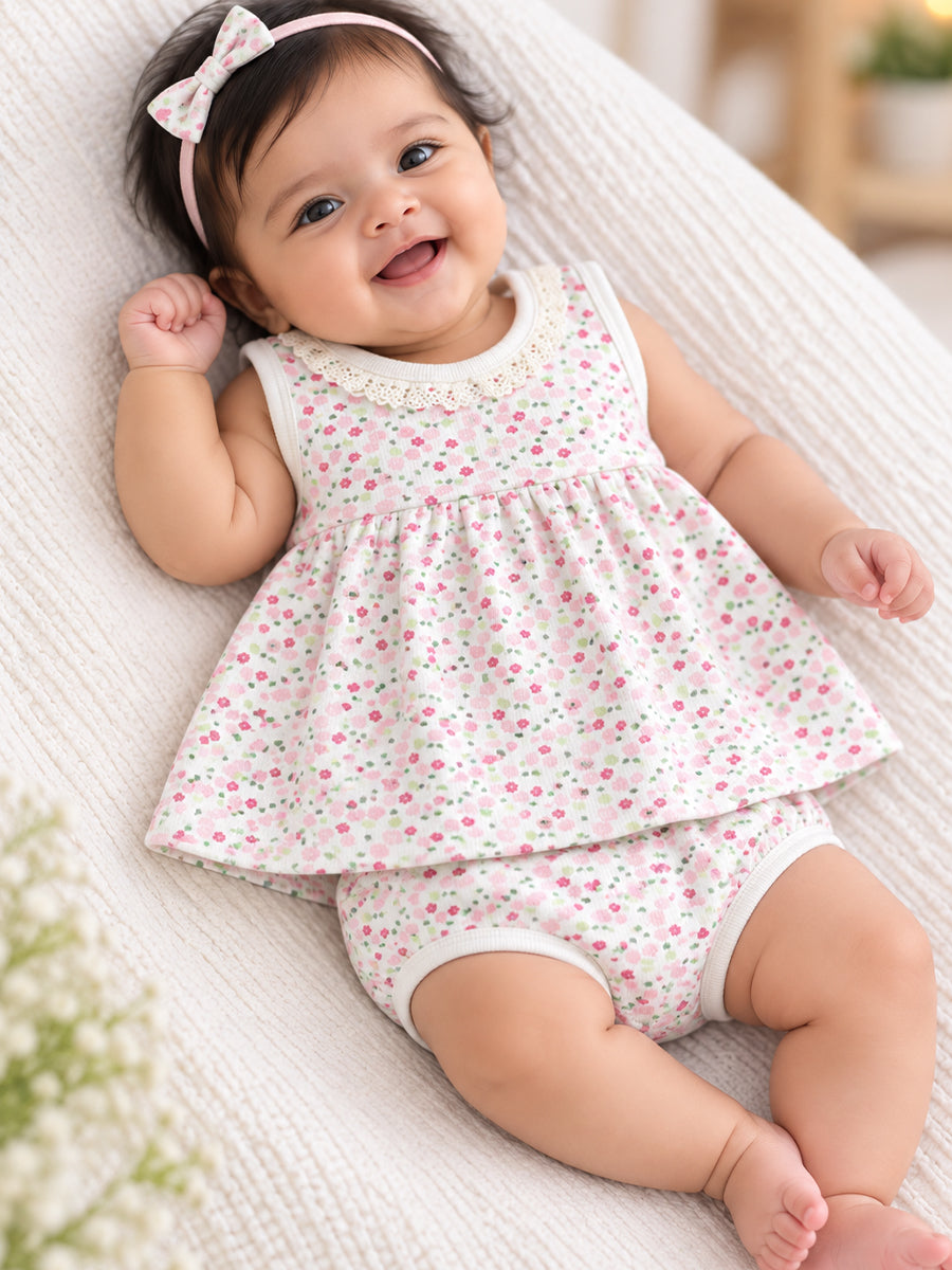Ziva Baby Girl Frock with Pantie – Soft Ivory Pink Floral Print | Premium Knitted Cotton | Crochet Lace Neckline & Back Knot Tie | 2-Piece Set
