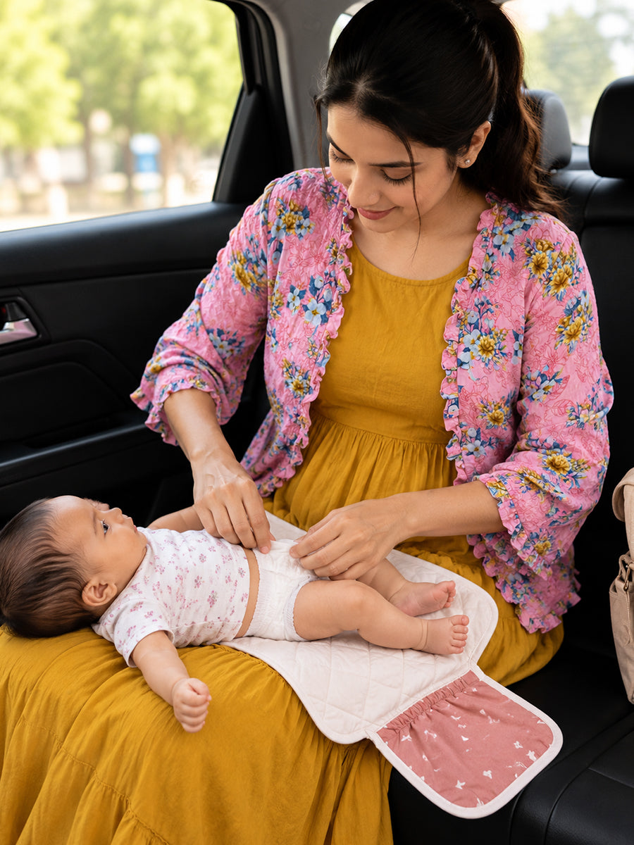 Ziva Baby Nappy & Diaper Changing Sheet – Foldable Travel Changing Mat with Storage Pocket | Peach Pink Little Bird Print