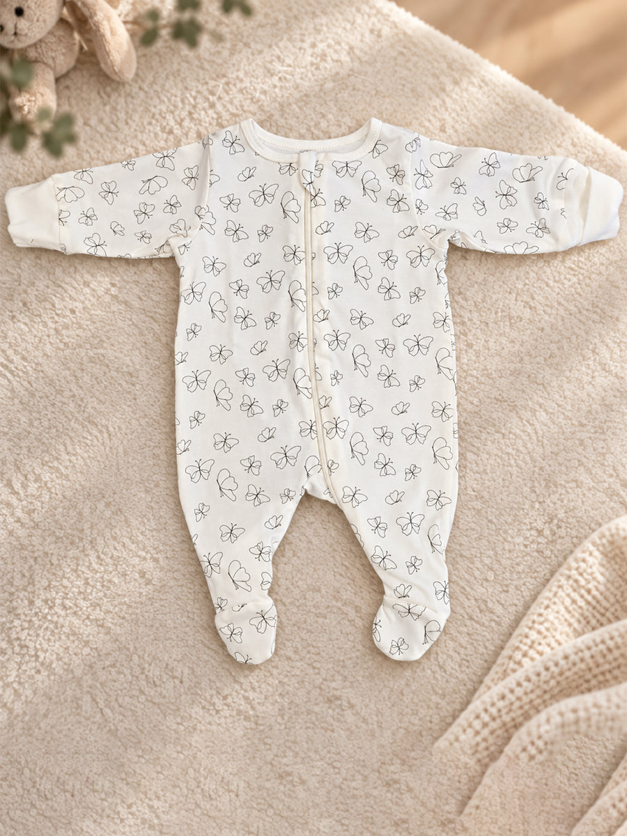 Ziva Baby Sleepsuit with Cap – Off-White Butterfly Print | Premium Knitted Cotton | Front Zip | Fold-Over Mittens & Integrated Booties