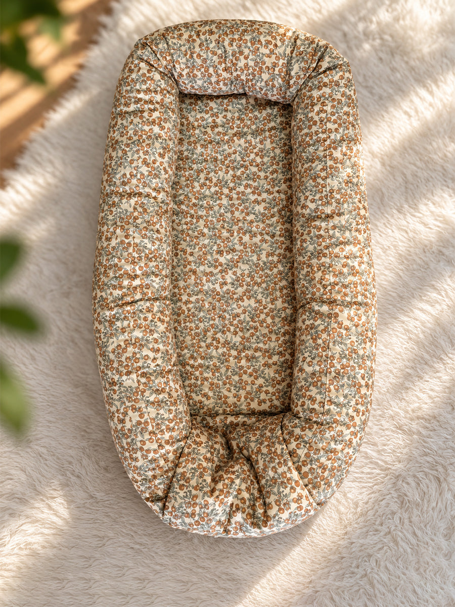Premium Organic Cotton Multipurpose Baby Nest – Newborn Baby Lounger & Baby Bed | Rust Orange Botanical Fruit Print | Ziva Collected | Carefully Selected for Your Little One
